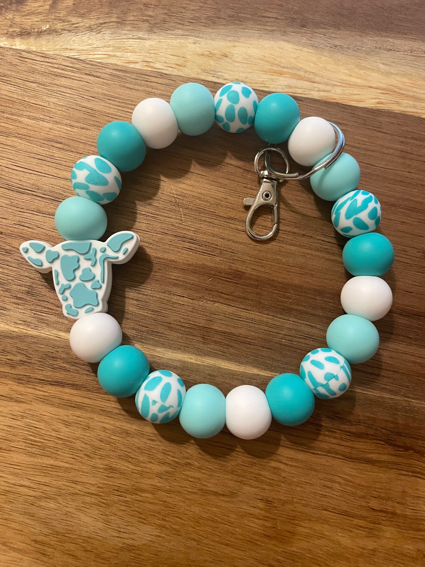 Teal Cow Wristlet