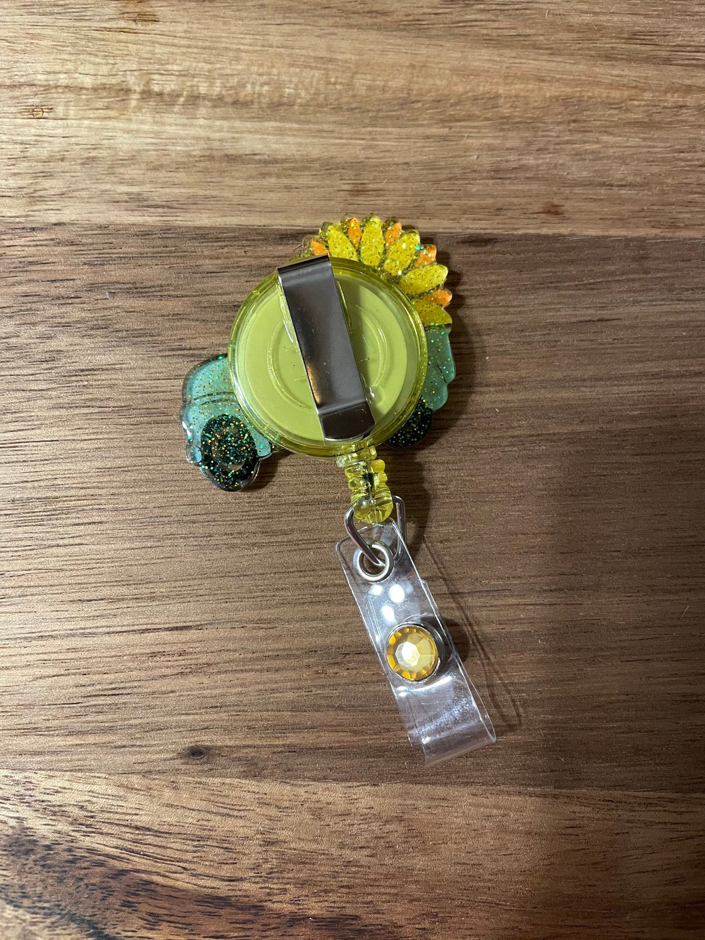 Vintage Sunflower Truck Badge Reel