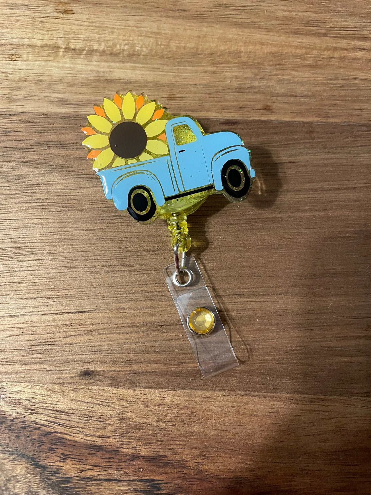 Vintage Sunflower Truck Badge Reel